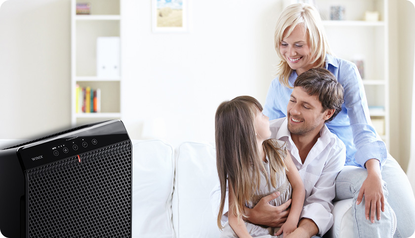 5520_tested&trusted_01 5520 Air Purifier Tested and Trusted (family scene with unit in livingroom)
